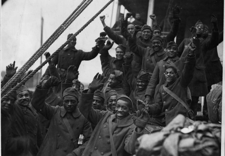 Members of the all Black U.S. Army Infantry Regiment known as the "Harlem Hellfighters" return to New York City in 1919. 