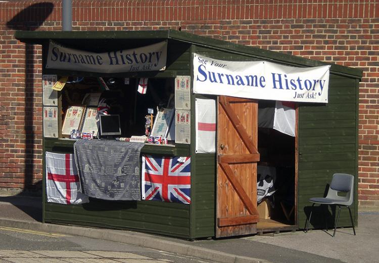 A stand at Portsmouth Historic Dockyard offering information on surname history.