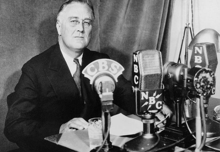 Photograph of Franklin D. Roosevelt at the White House in Washington, D.C., delivering a national radio address on September 30, 1934.