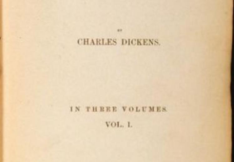 Single page of aged paper reading: Great Expectations by Charles Dickens in Three Volumes: Vol I