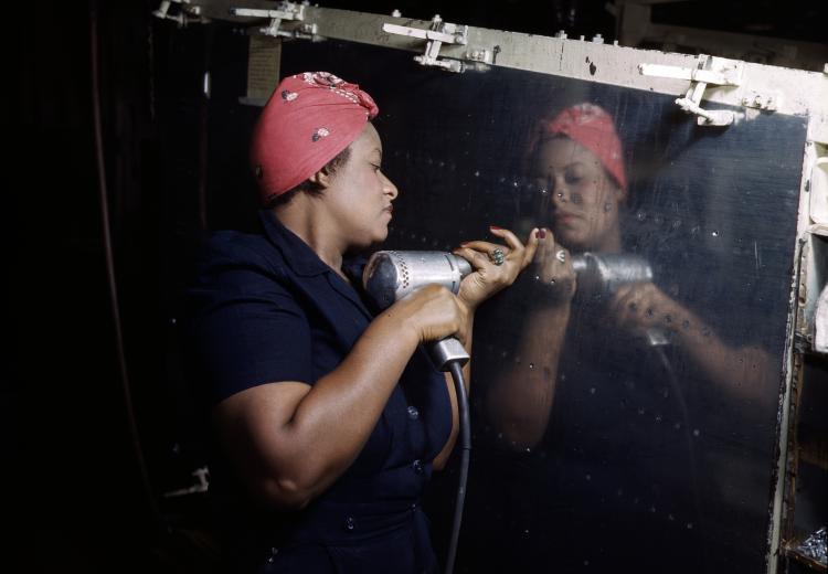 "Rosie the Riveter" working on an A-31 "Vengeance" dive bomber in 1943.