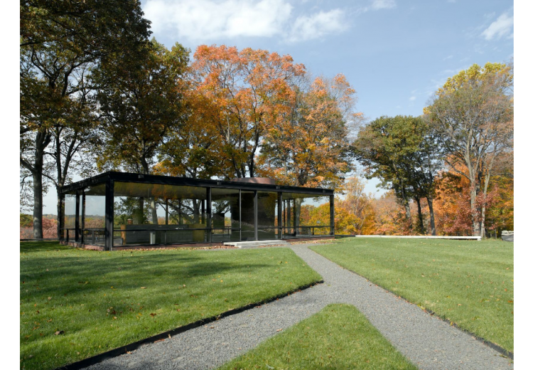 A photograph of Johnson's Glass House in the fall.