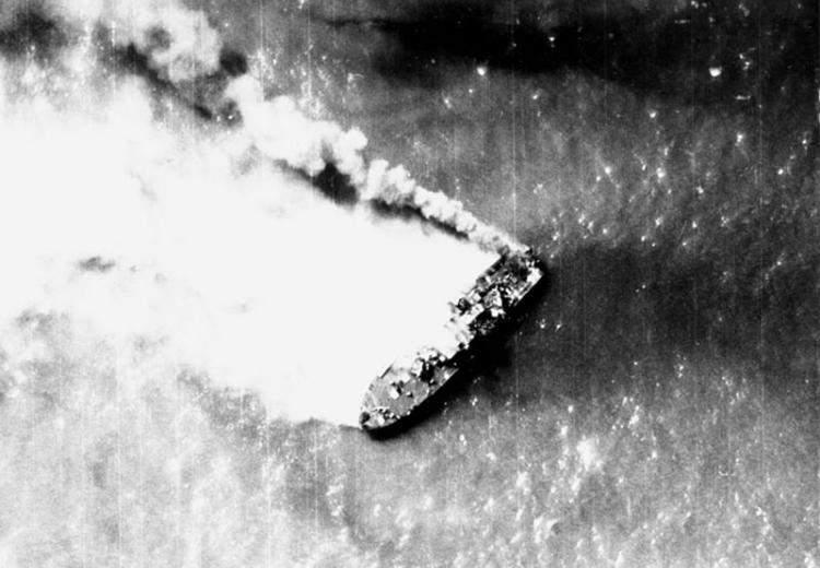 A North Vietnamese Shantou-class gunboat burns near Hon Ne Island